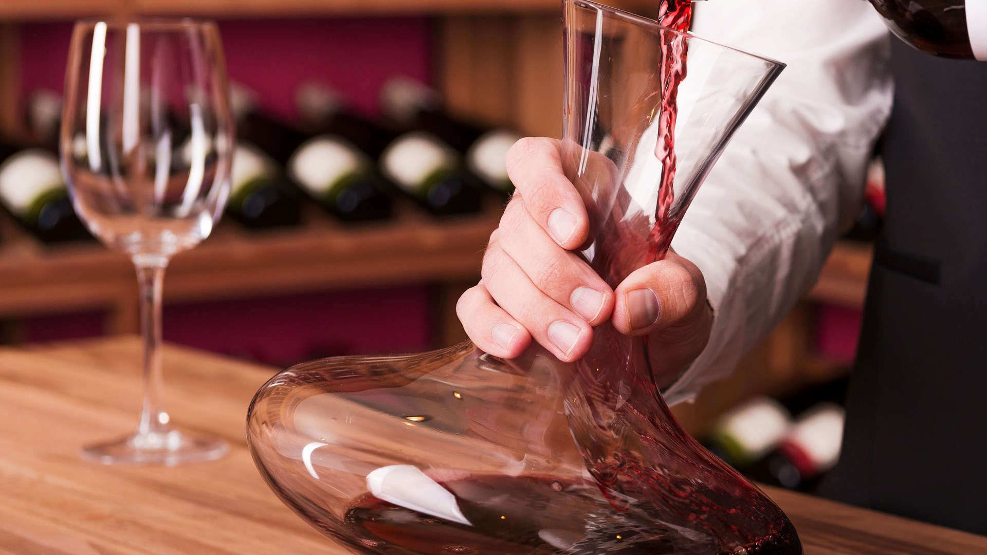 Pour gently and use a so-called "duck-shaped" carafe.